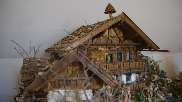 nativity scene and worship in alpine style