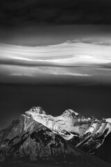 chinook clouds over snow-covered mountains