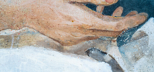 A young man with curly hair holds a handkerchief in his hand. The young man lies on a pillow....