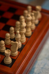 Closeup of chessboard, highlighted by the king