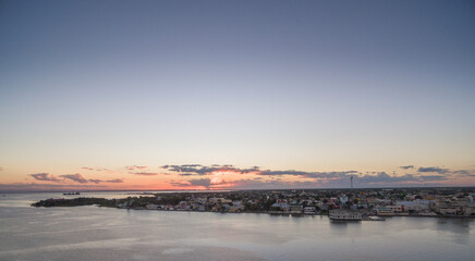 Caribbean Sea and Belize Cityscape. Sunset