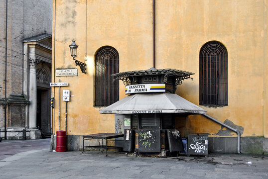 Closed newspaper kiosk in a deserted square near the church of the Steccata, Parma city center, Emilia Romagna region, Italy