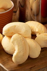Delicious cheese biscuit on cutting board. Selective focus.