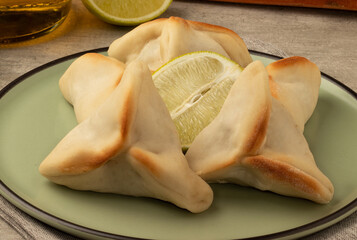 Focus on typical Arabian food sfiha.