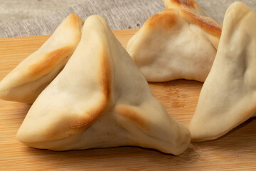 Traditional Arabian snack sfiha. Selective focus.