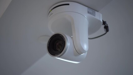 White motorized camera with large lens close-up. Camera for live broadcasting and video recording.