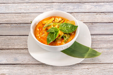 Red Curry is a very popular curry in Thai cuisine based on the use of heated coconut milk with red curry paste and fish sauce