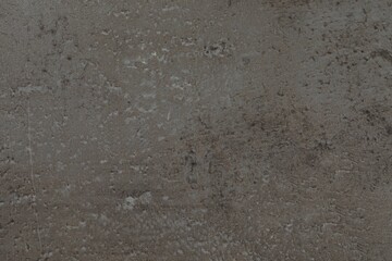 Grey stone surface as background, closeup view