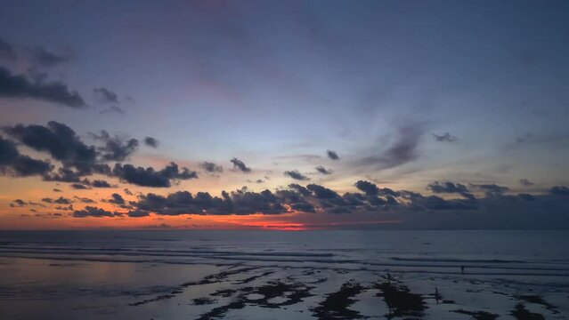 Timelapse of Majestic sunset landscape. Amazing light of nature cloudscape sky and clouds moving away.
