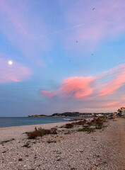 Birds Flying at Dramatic Pink and Orange Sunset by the Mediterranean