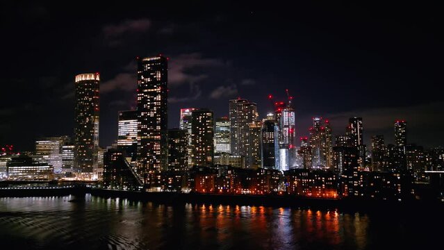Skyline of Canary Wharf by night with the skyscrapers of London - travel photography
