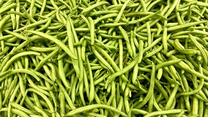 green beans background in the supermarket. Houston, Texas, USA