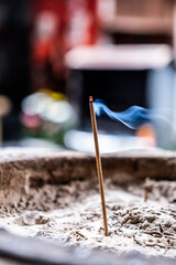 Smoking inscense in a shrine in Kyoto Japam