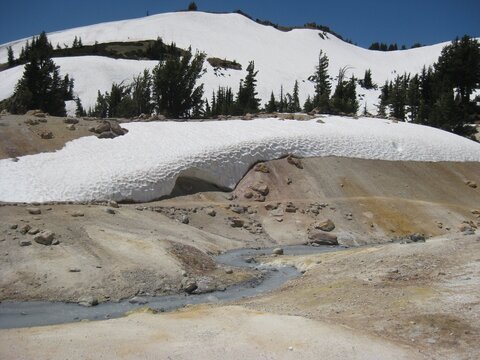 Big Snow Drift in July at Hydrothermal Area in Northern California 