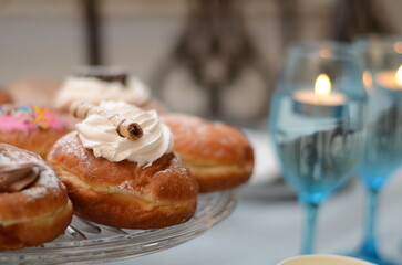 Close up of donuts on donut platter at Hannukah Chanukah Jewish holiday party Christmas
