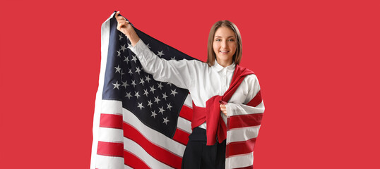 Beautiful young woman with USA flag on red background