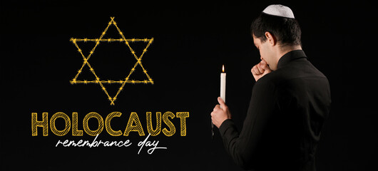 Banner for International Holocaust Remembrance Day with Jewish man holding candle on dark background