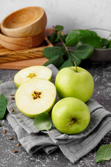 Ripe green apples on table