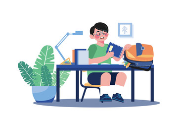 Boy Putting Books In School Bag