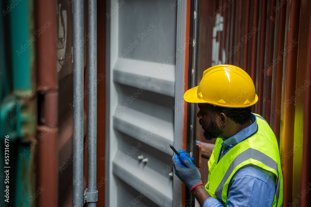 Poster Engineer or foreman checking about shipping of container box in warehouse stock yard.
