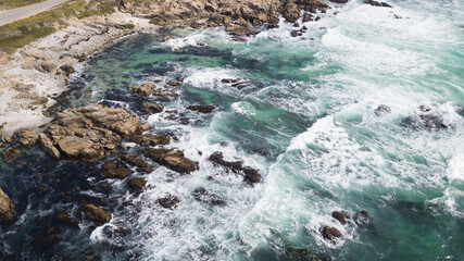 waves flowing over rocks
