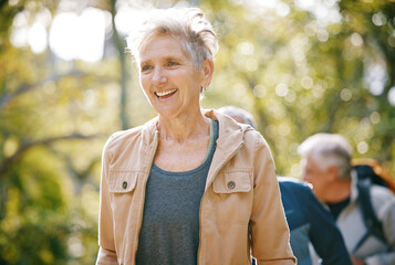 Elderly woman, fitness and hiking in park, happy with freedom outdoor and exercise with active...