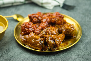 Fried chicken with sauce in Korean style for meals and snacks