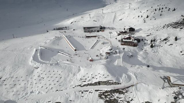 Establishing Shot from the ski resort Belalp near Blatten in Switzerland. The gondola lift takes you up to the mountain and from there the chairlift continues