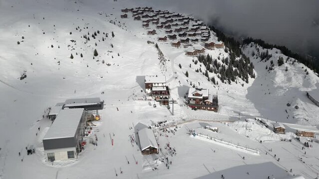 The Belalp ski resort in the canton of Valais in Switzerland with vacation homes, ski lifts and gondola lifts. Aerial Shot