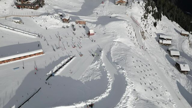 The Belalp ski resort in the canton of Valais in Switzerland. Aerial view of the beginners lift, gondola top station and ski slopes