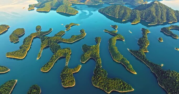 Aerial footage of Thousand Island Lake natural scenery in Hangzhou, Zhejiang Province, China. Green mountain and lake nature landscape in summer.