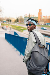 Afro Boy Walking in the City