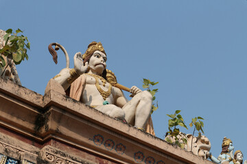 Obraz premium Big Hanuman on the gate leading to the temple in Puri, Odisha, India.