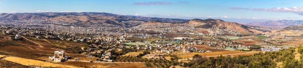 Fototapeta na wymiar عين الباشا وصافوط وجبال السرو - الاردن- Ain Al-Basha, Safout, and the Cypress Mountains - Jordan