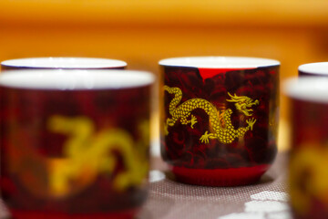 Chinese new year tea cup set on red background