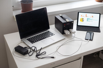 Portable multitasking charging station, power technology.