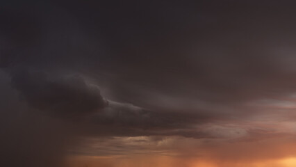 Fototapeta na wymiar Detail shot of epic storm clouds during sunrise