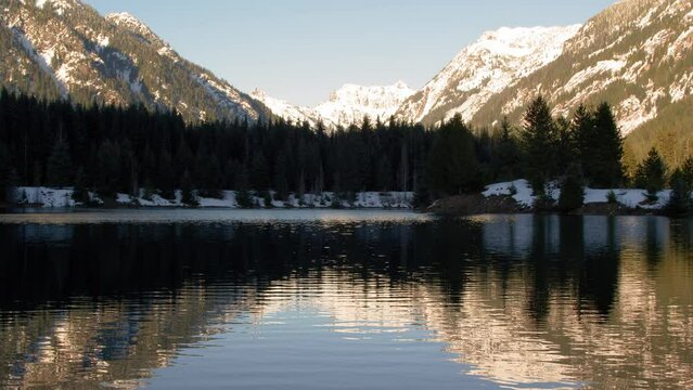 Gold Creek Pond Reflecting Magic Hour on Mountain Snow