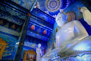 Wat Rong Suea Ten, Temple of the Dancing Tiger,white statue of buddha, in the blue buddhist temple -Chiang Rai-Thailand