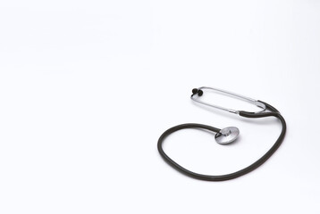 Fototapeta premium Stethoscope for checking pulse on white background