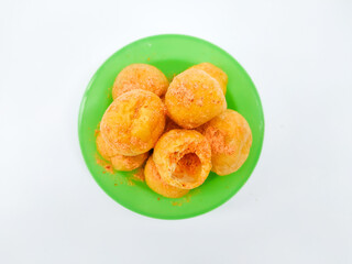 Round Tofu is a favourite snack from Indonesia which is made from fried round tofu sprinkled with chilli, salt and Balado seasoning