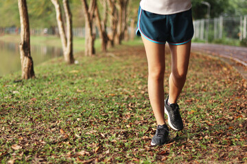 Woman enjoys running outside with beautiful view.