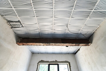 Insulation of the ceiling with heat-insulating materials. Construction and interior decoration of...