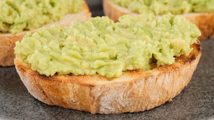 Fresh Avocado toast close up. Healthy vegan food concept