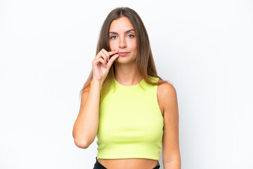 Young caucasian woman isolated on white background showing a sign of silence gesture