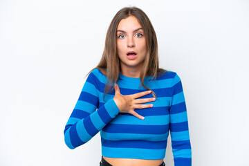 Young caucasian woman isolated on white background surprised and shocked while looking right