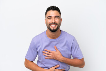Young Arab handsome man isolated on white background smiling a lot