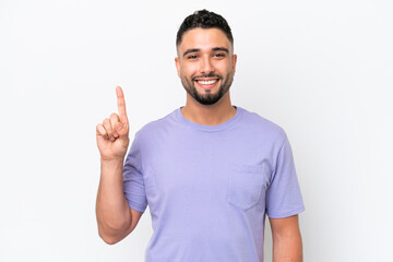 Naklejka premium Young Arab handsome man isolated on white background pointing up a great idea