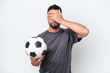 Arab young football player man isolated on white background covering eyes by hands. Do not want to see something