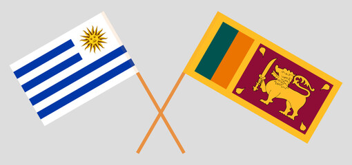 Crossed flags of Uruguay and Sri Lanka. Official colors. Correct proportion